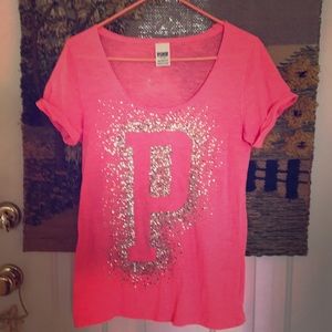 PINK lrg tee w/ P in sequins on front.